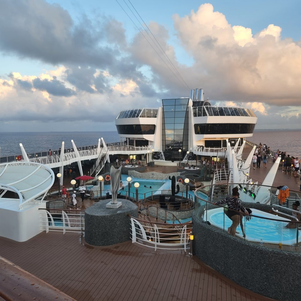 Top of the ship with hot tubs and pools