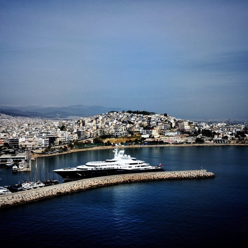 piraeus city with a big yacht