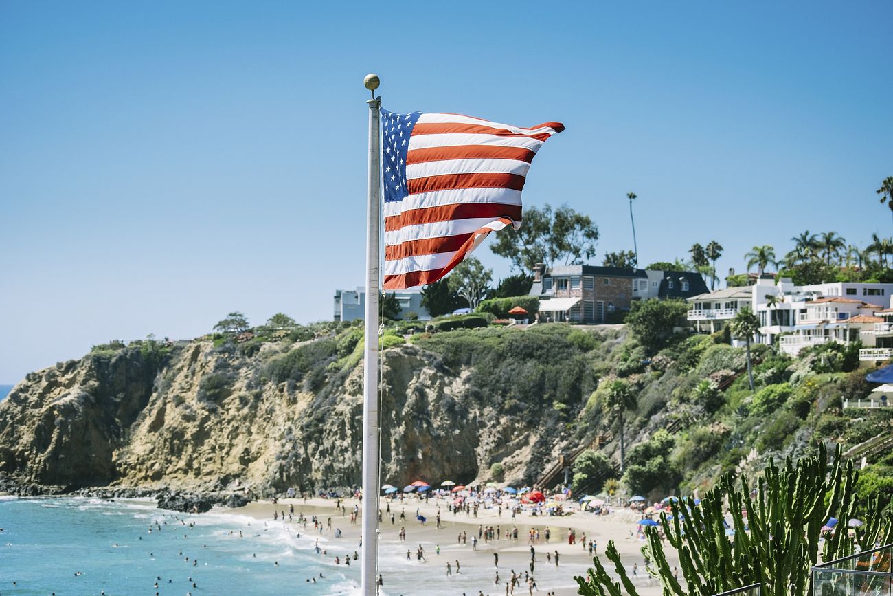 The American flag flutters in the wind in laguna beach