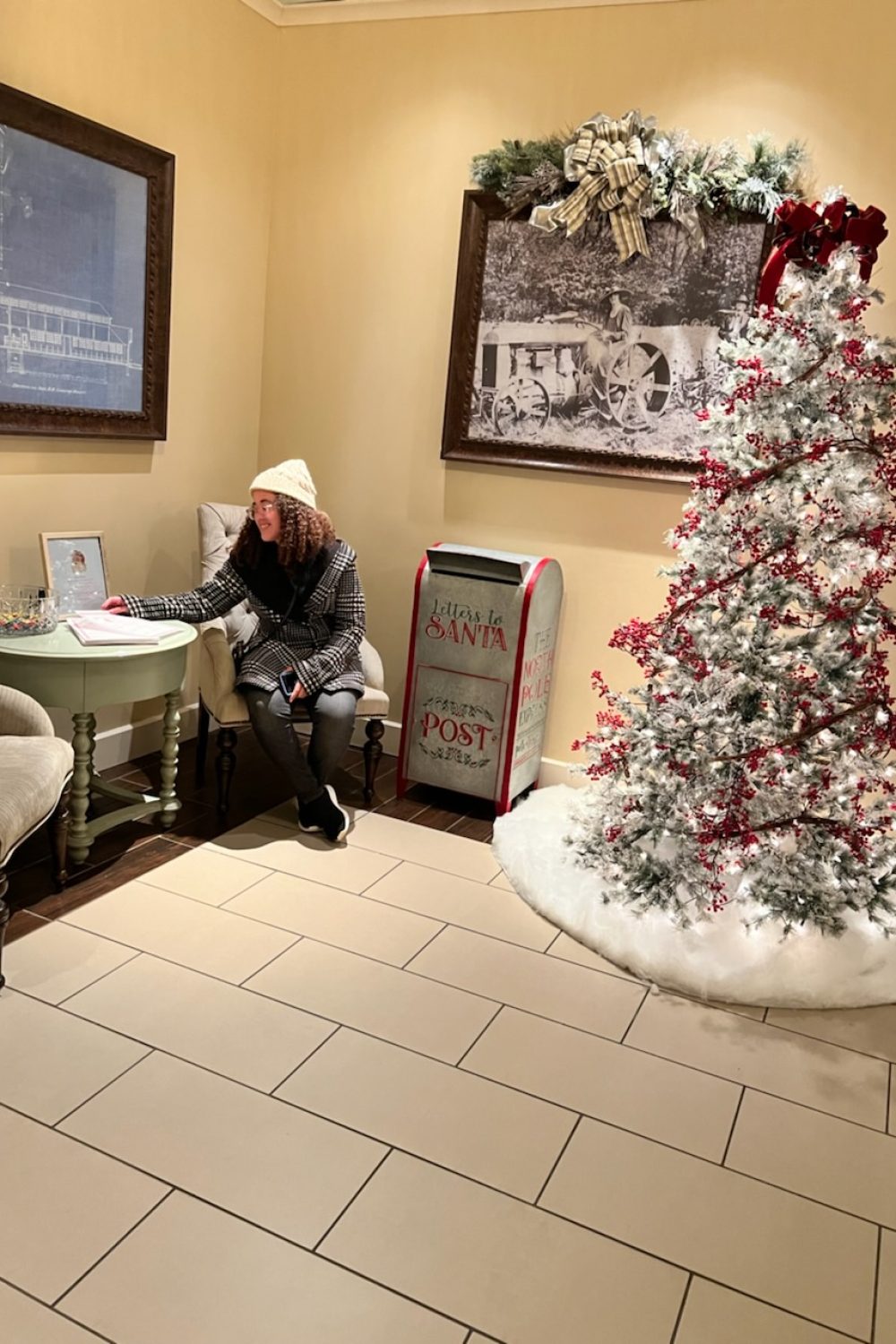 sitting in lobby with christmas decorations