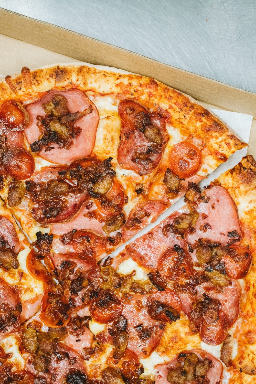 meat toppings on pizza