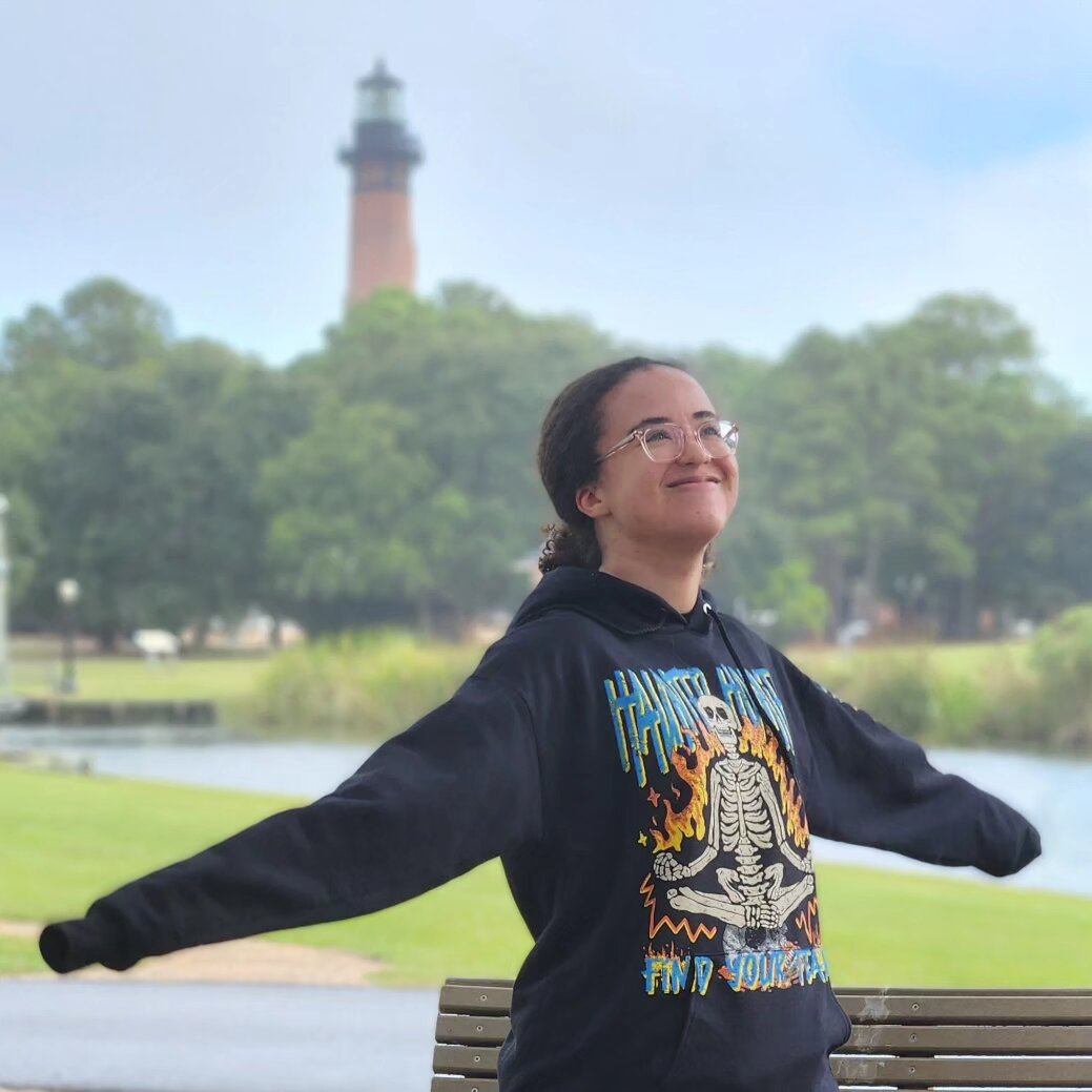 Standing in front of currituck lighthouse