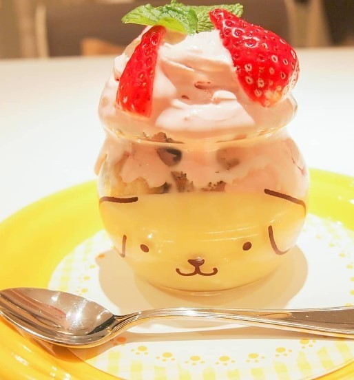 cute dog glass dessert with strawberries