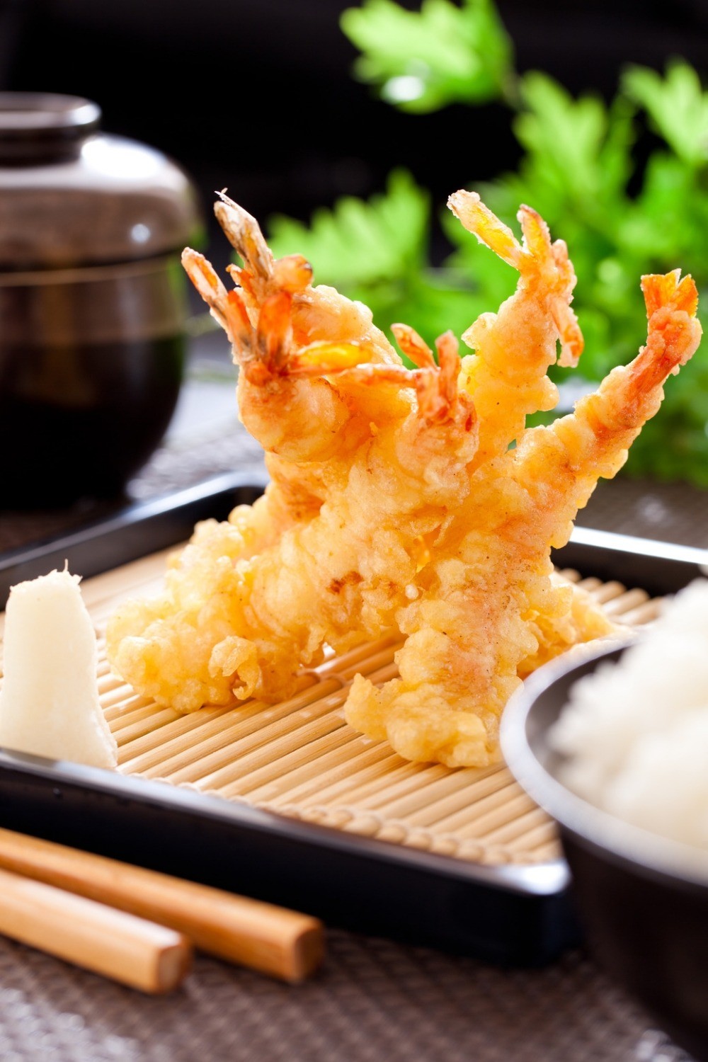 tempura sticking up on plate in japanese restaurant in tokyo