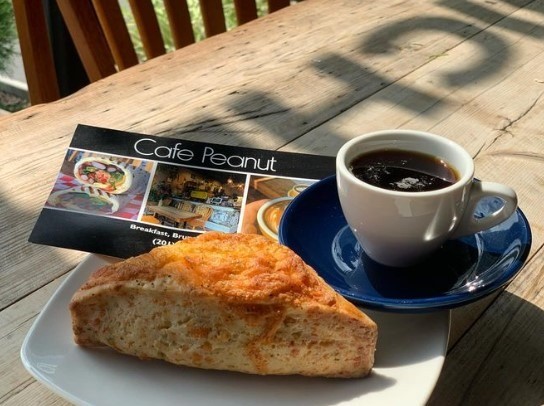 cinnamon bread with dark roasted coffee sitting outdoors on a table in new jersey