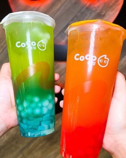 two bubble tea flavors in orange and green