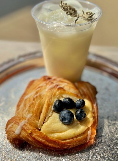 blueberry and cheese croissant with chai latte