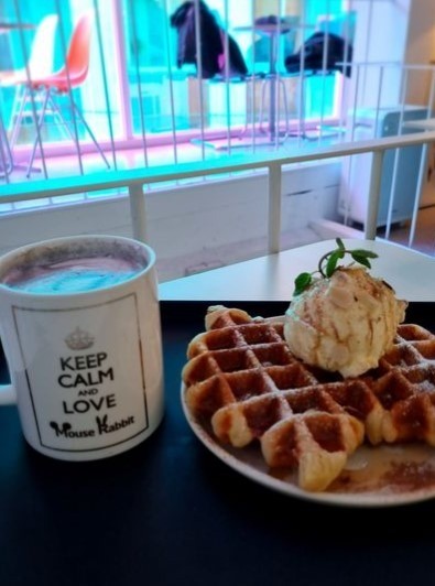 keep calm and love mouse rabbit mug with a plate full of waffles and ice cream