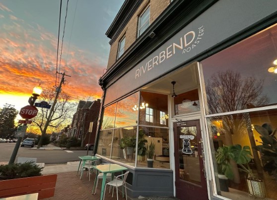 exterior of riverbend roastery at sunset