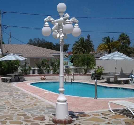 pool with elegant lamp post