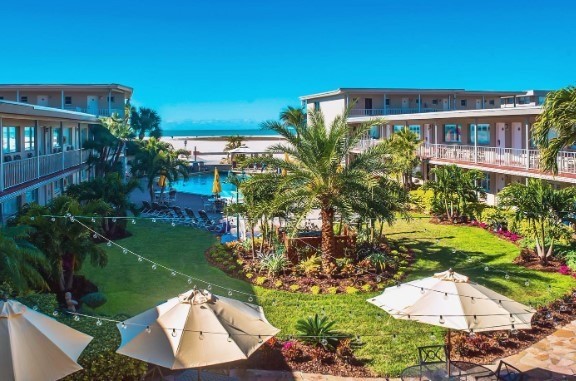 pool and palm trees at florida resort