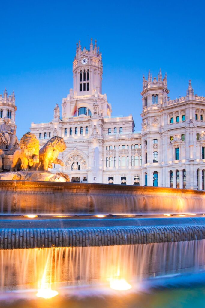 Plaza de Cibeles with huge fountain and statues of lions