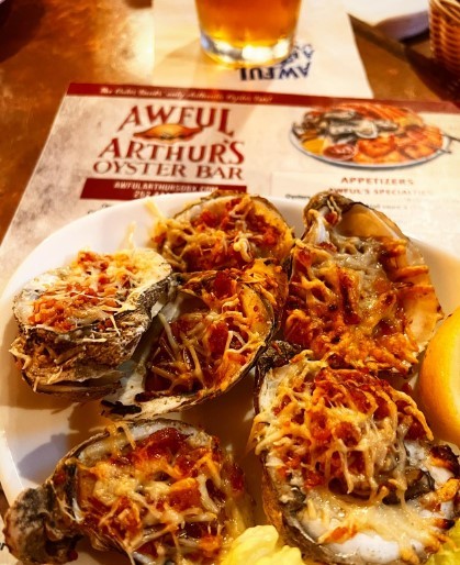 bacon and cheese on oysters at awful Arthur's