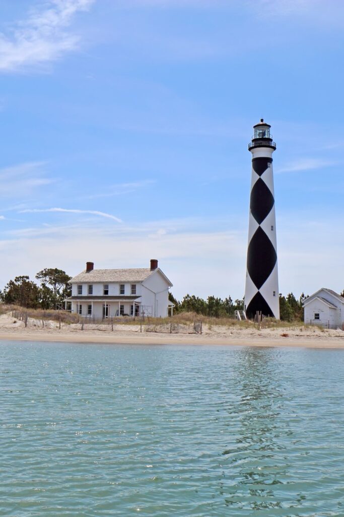 cape lookout lighthouse with fishing village