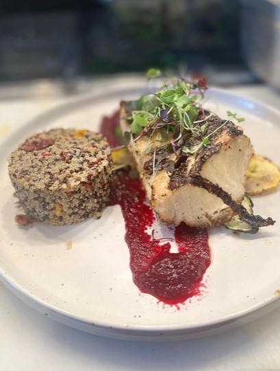 halibut served with quinoa salad and beets at local greek